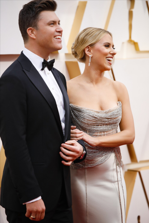 Colin Jost with his wife